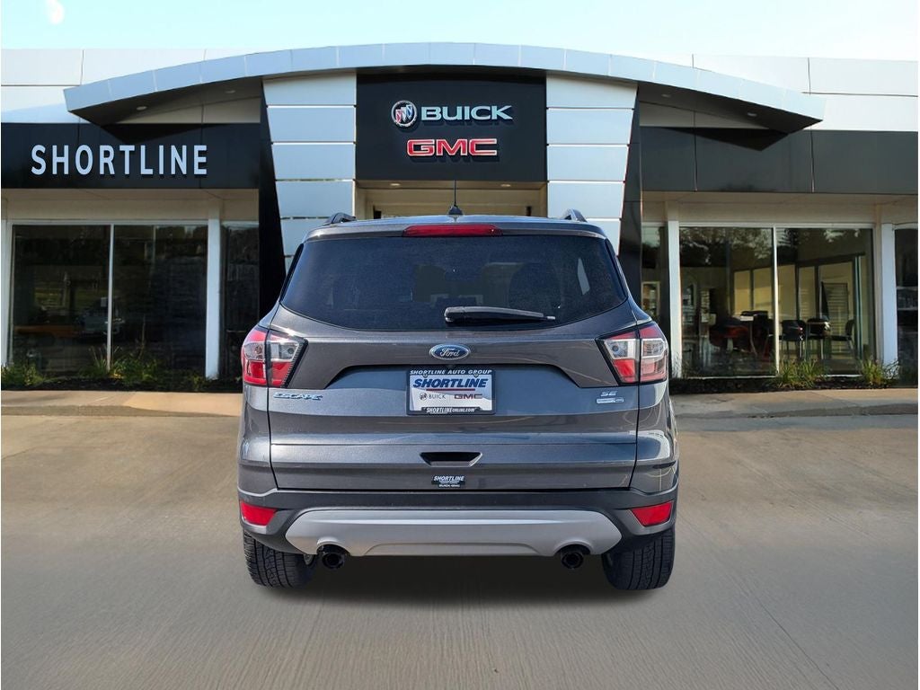Used 2018 Ford Escape SE with VIN 1FMCU9GD8JUA89482 for sale in Aurora, CO