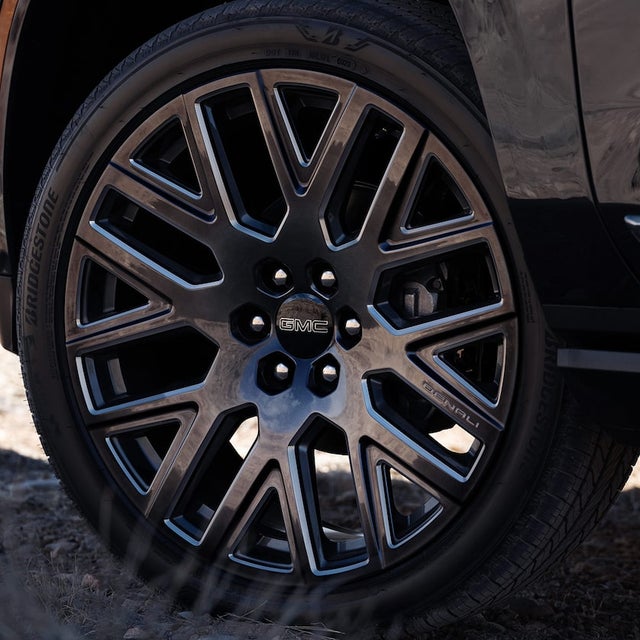 Close-up of the Black Rims on the 2025 GMC Yukon Denali Luxury 3 Row SUV