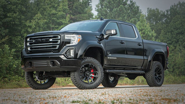 A black GMC Sierra 1500 Rocky Ridge custom built truck